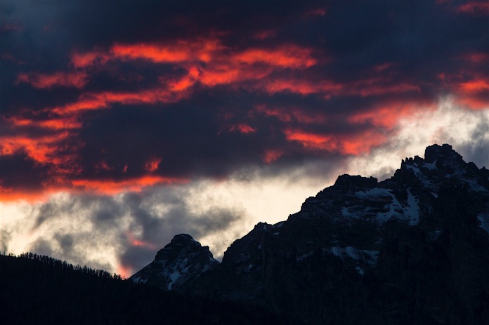 Dramatic clouds loom over Swabachwers Landing in Grand Teton National Park